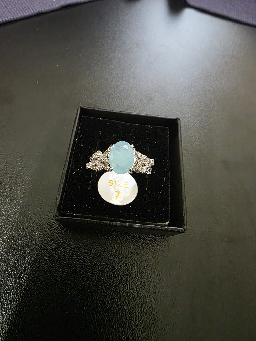 Rhodium Plated Blue Stone Ring with CZ Accents - Size 7